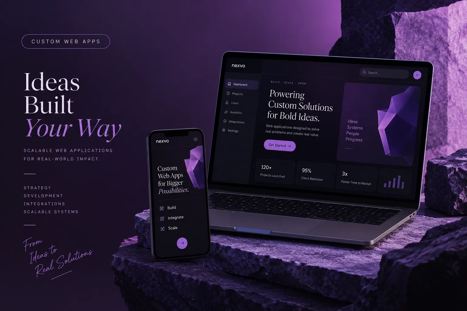 A laptop and phone showing a purple web app dashboard, set on dark stone